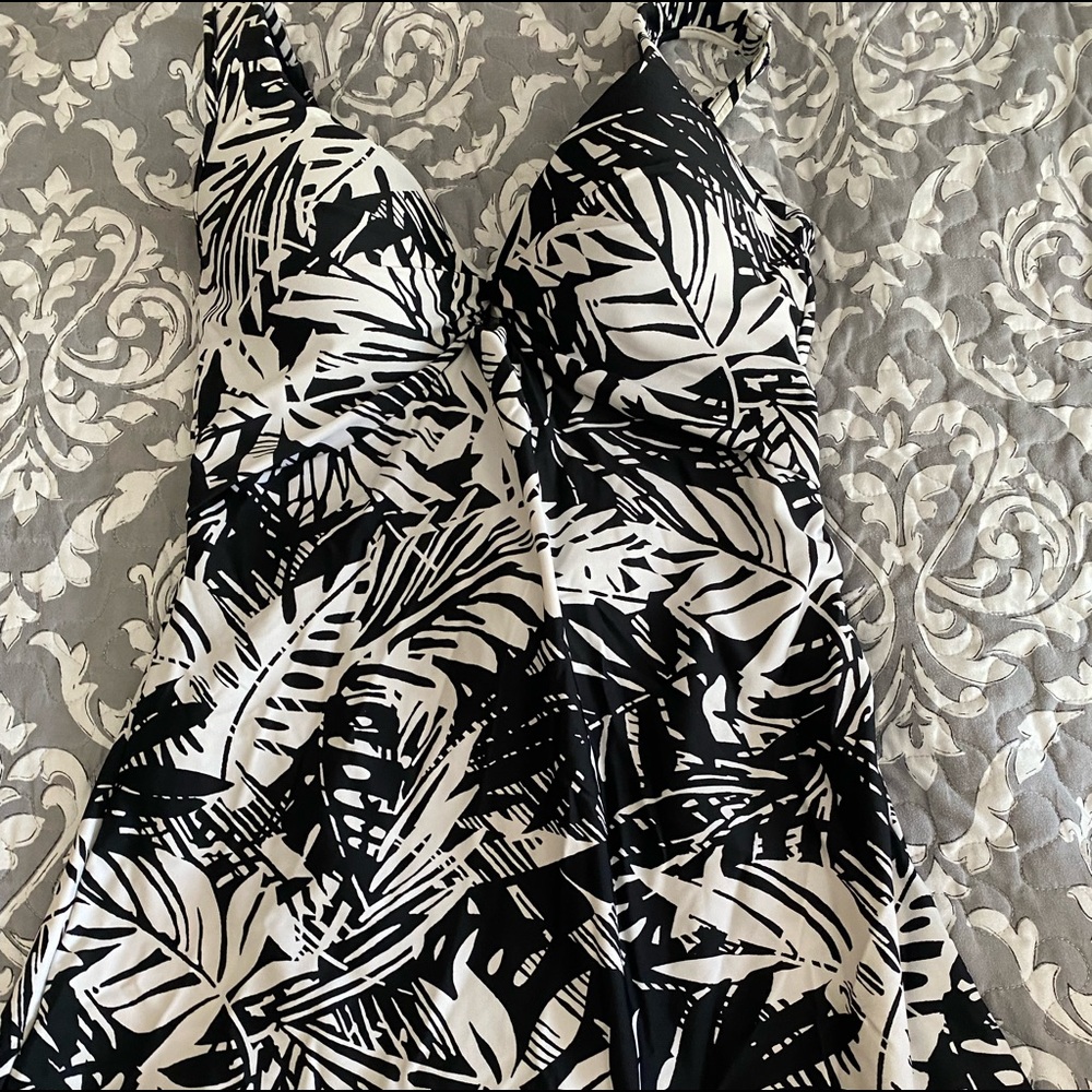 size 10 swimsuit, full body suit with the white part flowy over top